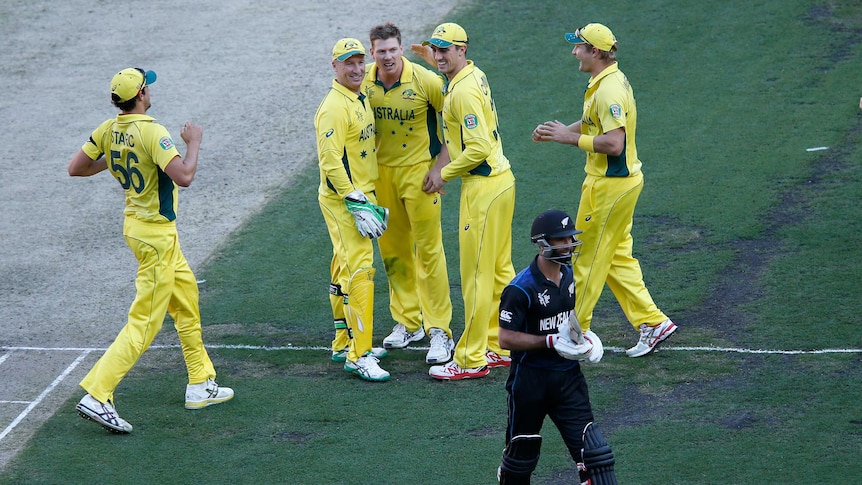 Grant Elliott walks off as Australia celebrates