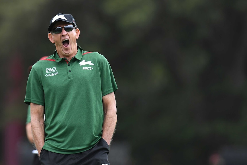 Wayne Bennett yawns at a Rabbitohs training session at Redfern Oval.