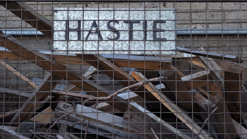 Discarded wood sits in a pile at the Hastie Group factory