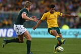 Kick happy ... Kurtley Beale grubbers the ball against the Springboks