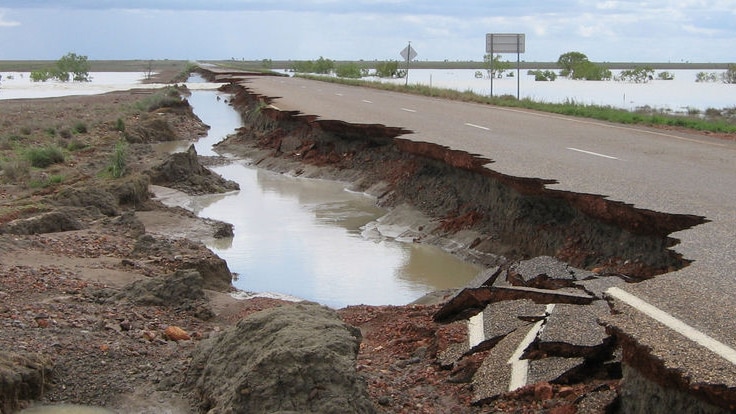 Large sections of the Barkly Highway - like this near Soudan Station - have been washed away by heav