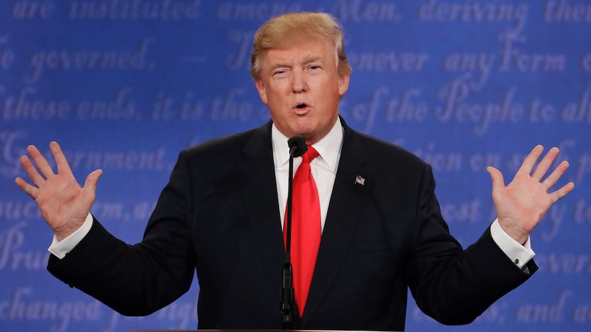 Donald Trump gestures during the third US presidential debate