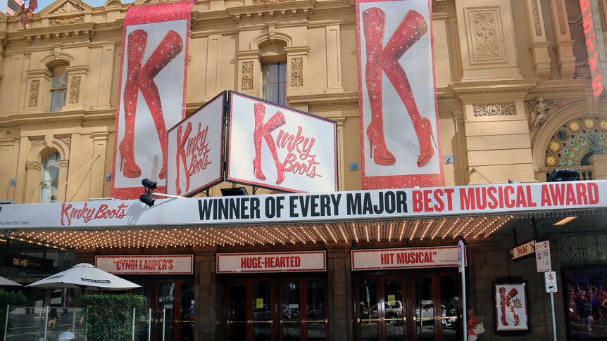 Exterior of Her Majesty's Theatre in Melbourne and signs for the production Kinky Boots