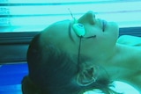 A close up of a woman getting a tan in a Perth solarium