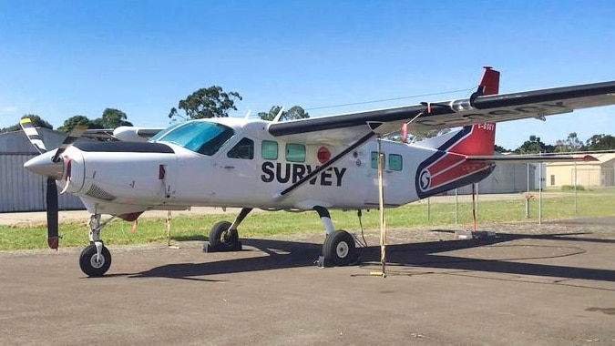 A plane with the word 'survey' written on the side