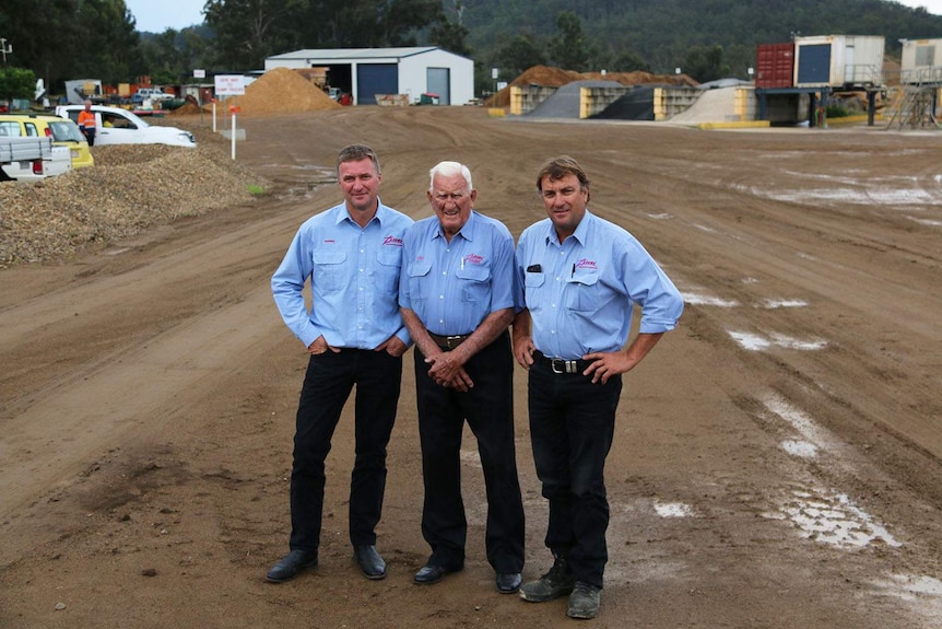 Darren, Viv and Brad Zanow stand together at the site of their Fernvale quarry business