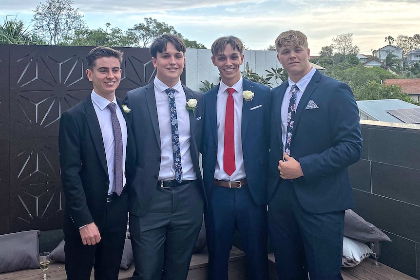 Connor Phillips (third from left) and his friends head to their Year 12 school formal in Brisbane.