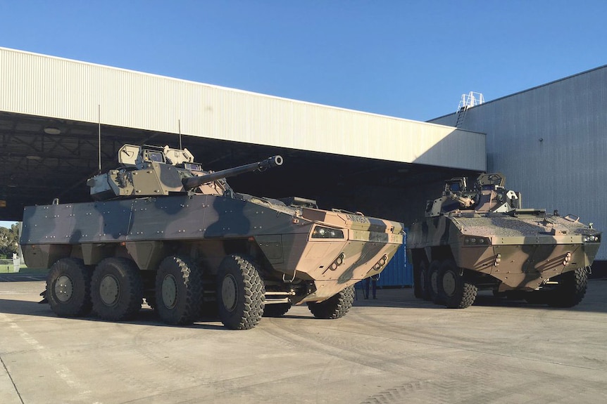 A photo of two armed military vehicles BAE Systems hopes to build in Melbourne.