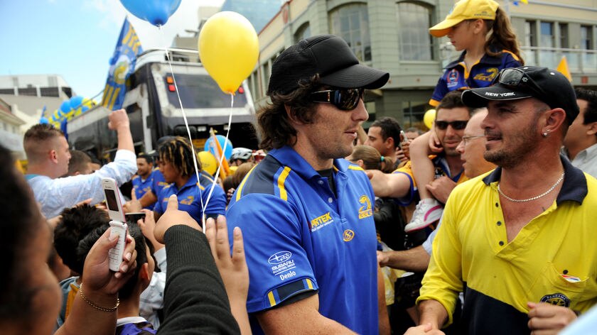 Hero welcome ... Nathan Hindmarsh geets the Eels fans
