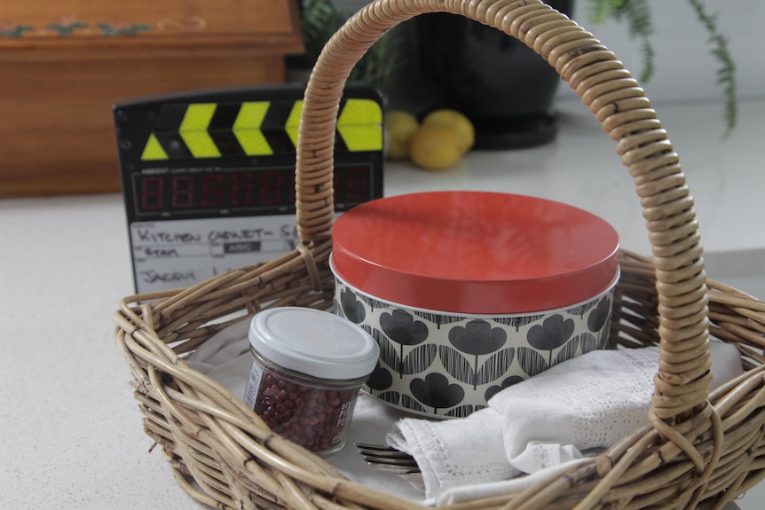 Annabel Crabb basket used in filming of Kitchen Cabinet on a beach