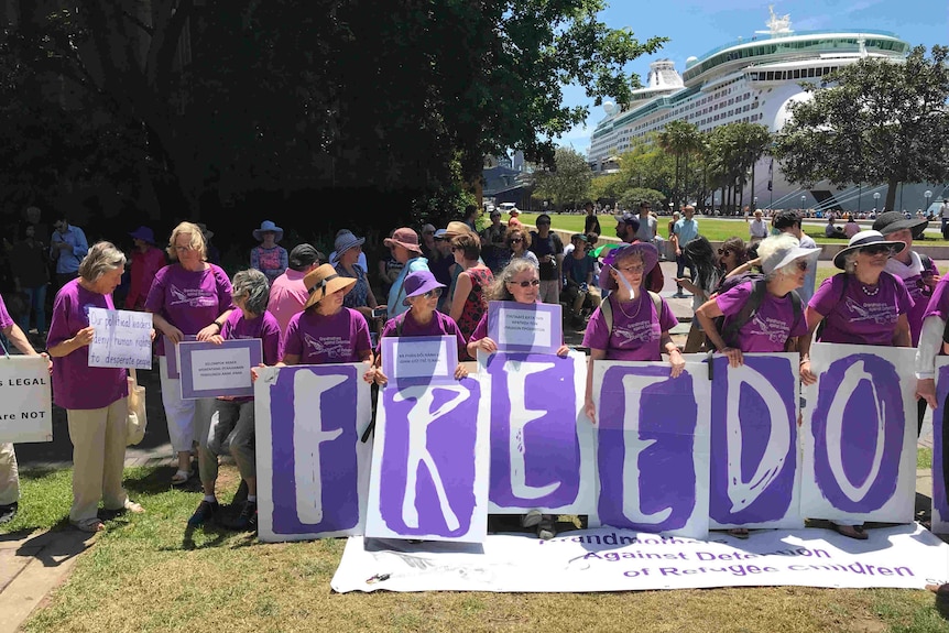 Grandmothers with big Freedom sign.