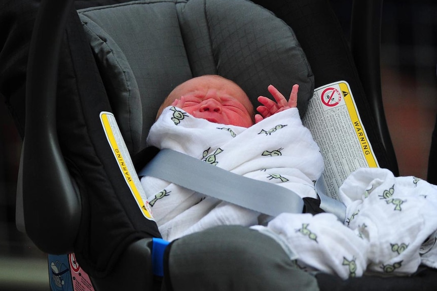 Baby son of Duke and Duchess of Cambridge, in car seat