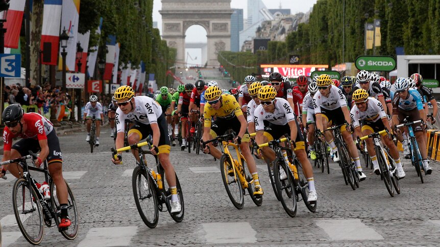 Chris Froome rides in Paris during final Tour de France stage