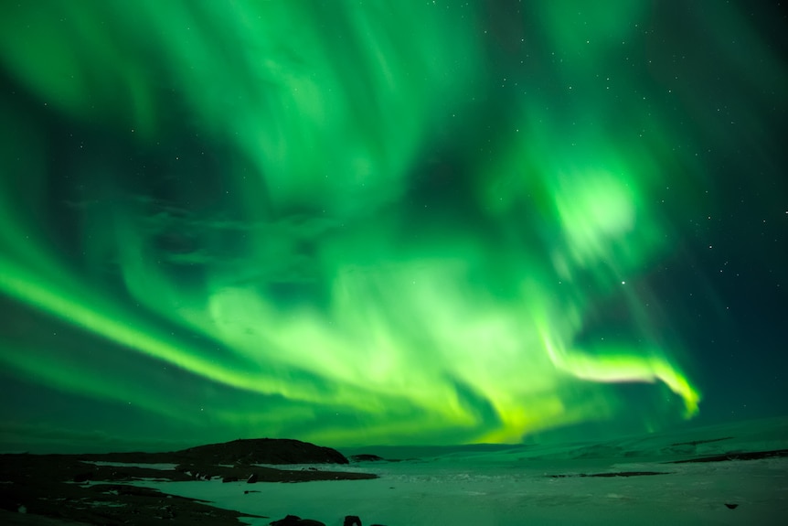 Lights of the aurora australis in the night sky.