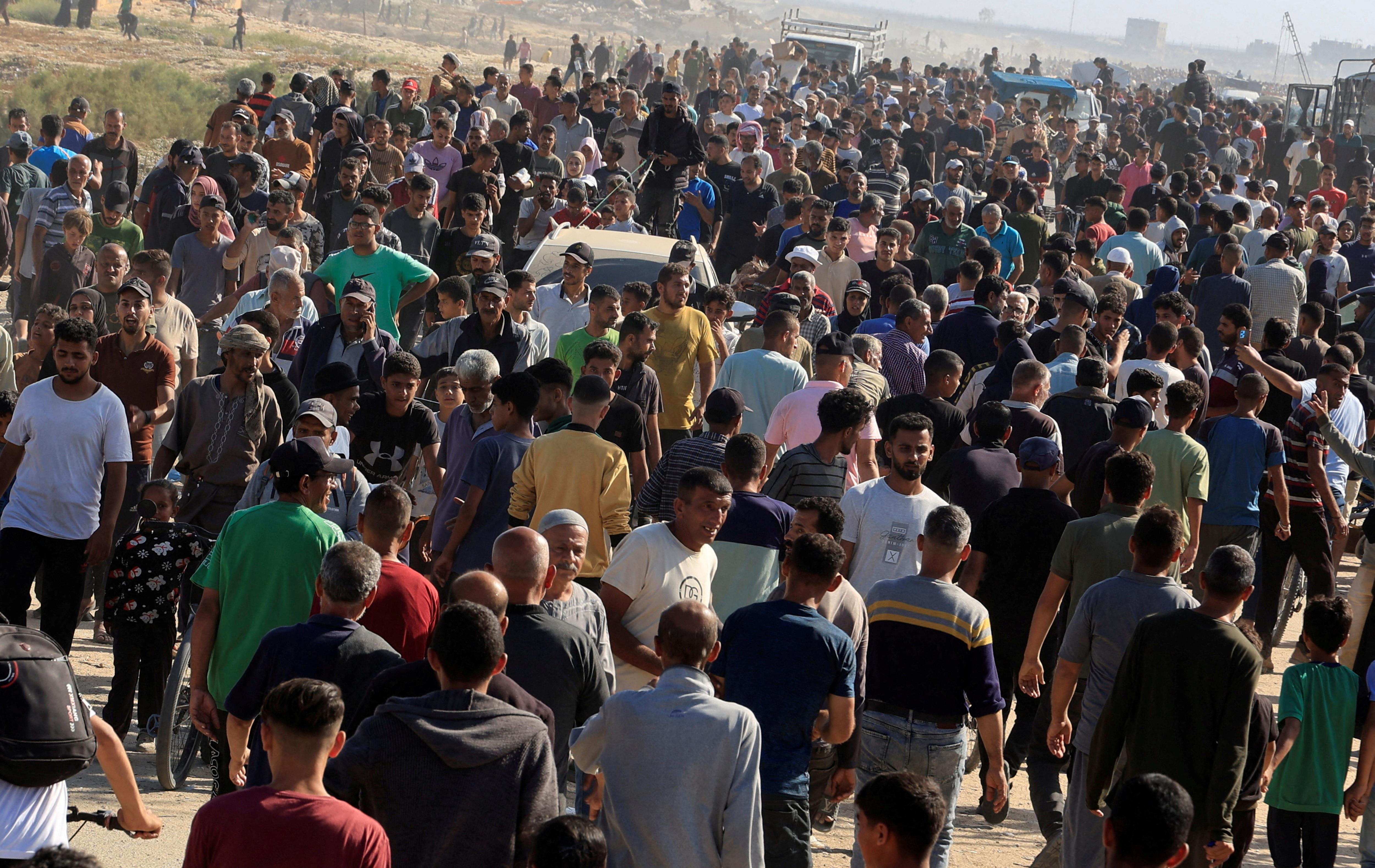 A large crowd of people walking