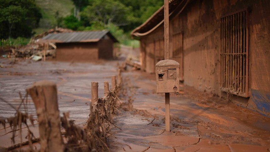 Mud-covered Paracatu de Baixo after Brazil mine disaster