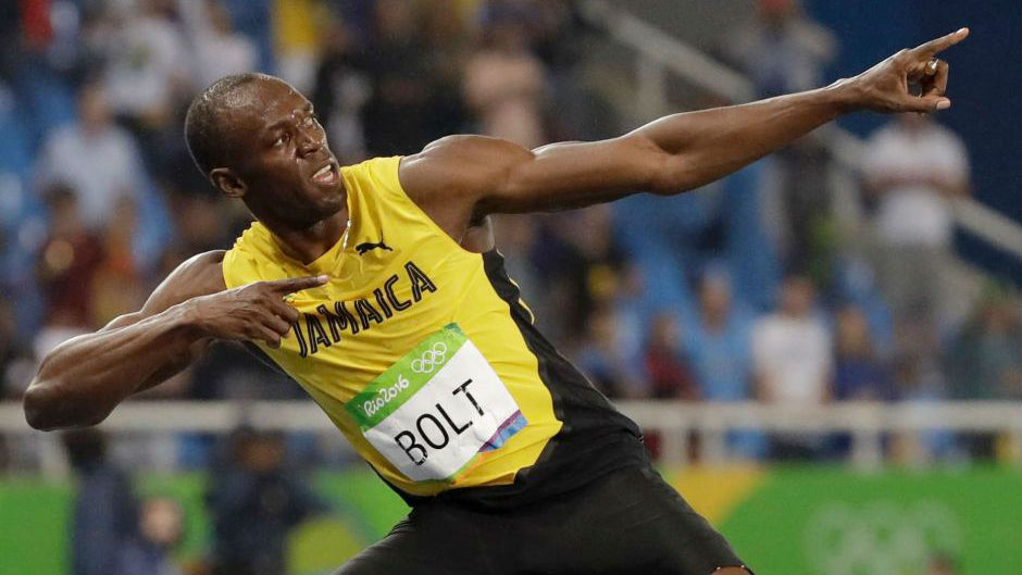 Usain Bolt strikes his famous lightning bolt pose. Photo: Getty Images