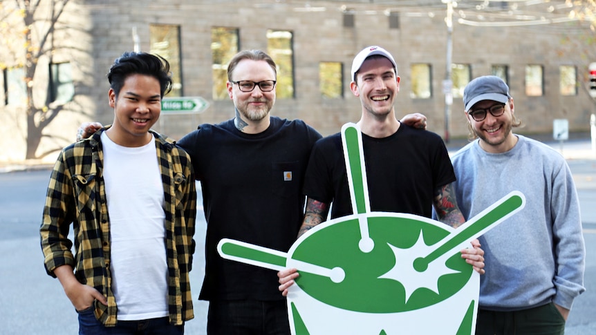 Melbourne band Bad Juju with the triple j Unearthed green drum.