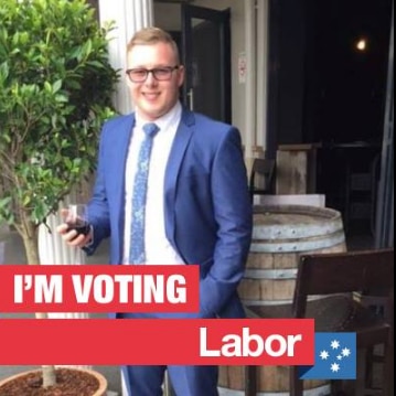 Sydney man and Labor supporter Trent Hunter with a glass of wine.