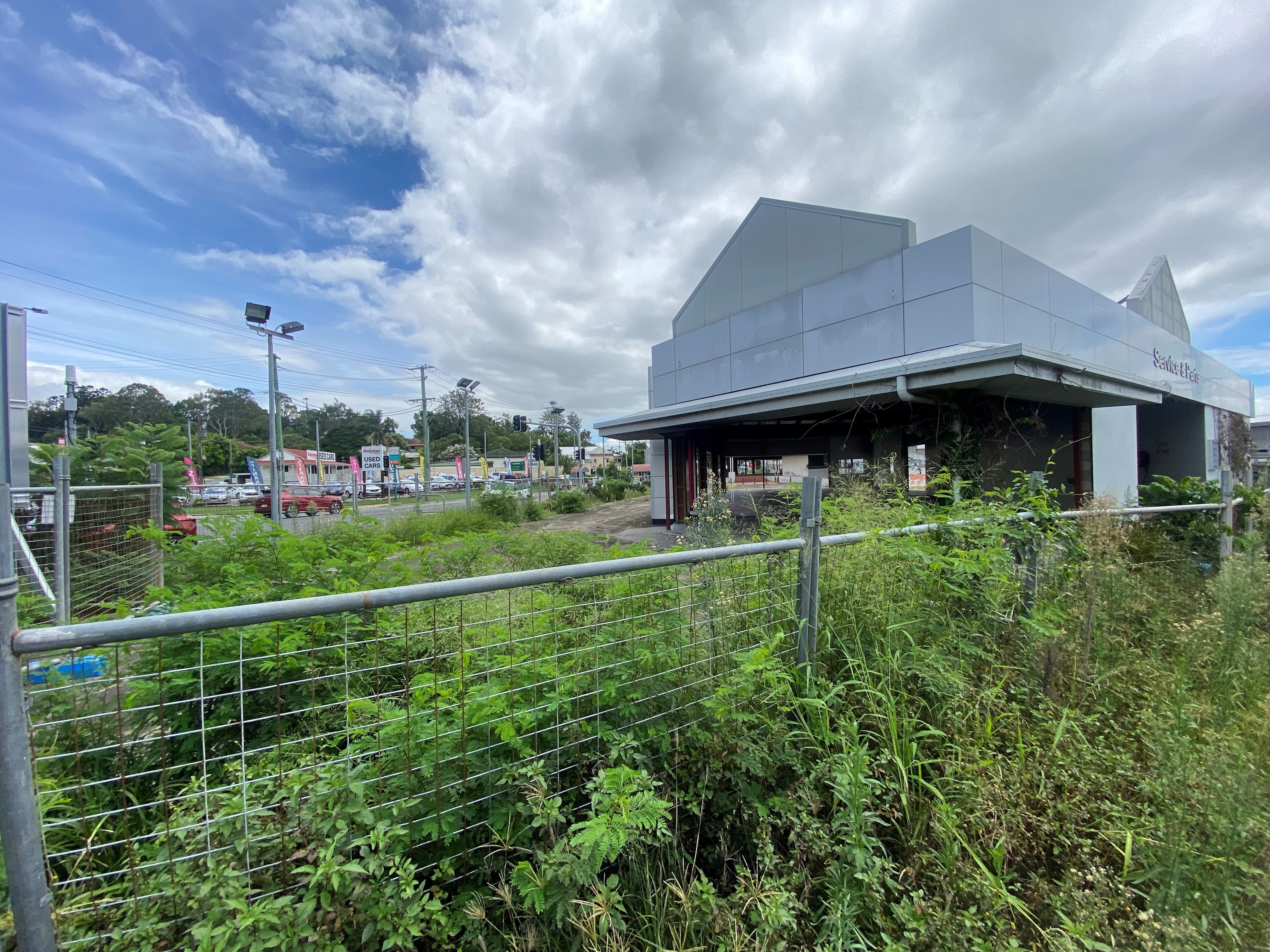 overgrown abandoned development site