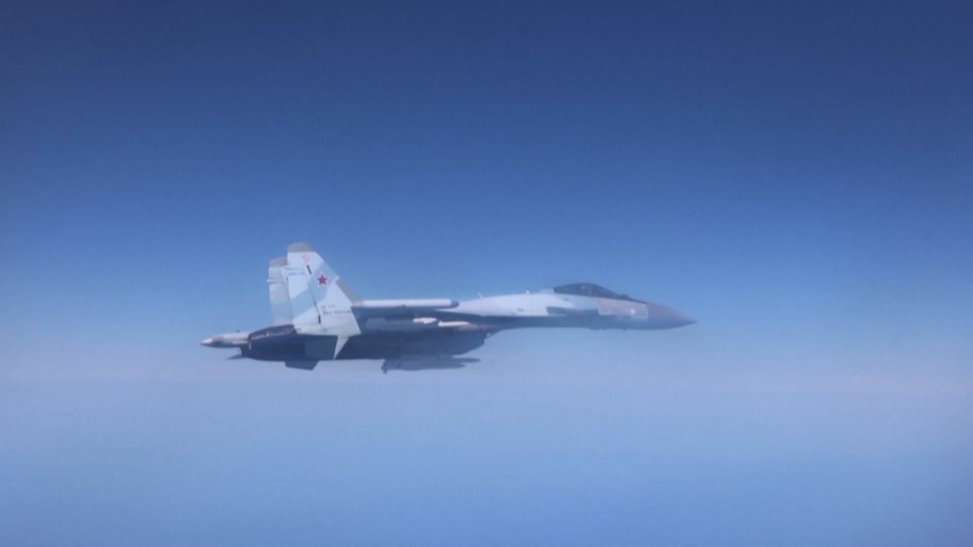 Jet flying across the sky