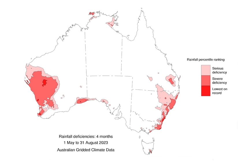 A map of Australia showing areas of pink and red signifying rainfall deficiencies during December 2022 to August 2023.