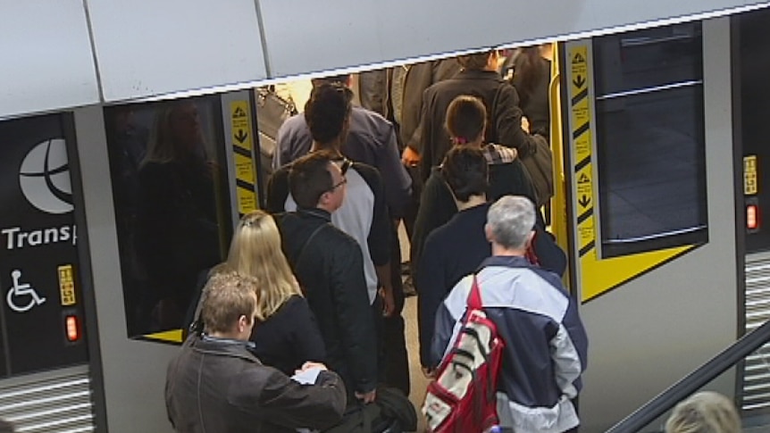 People boarding a train