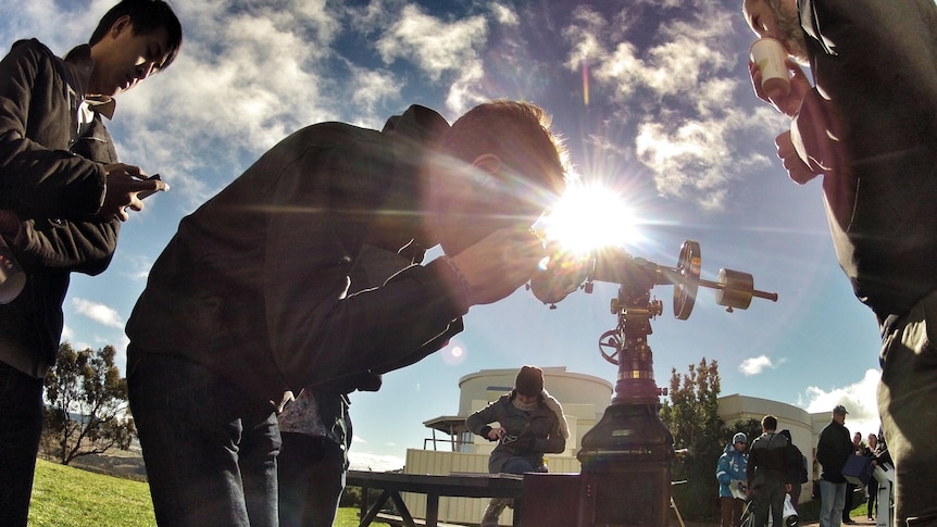 Amateur astronomers watch the transit of Venus at Mt Stromlo Observatory in Canberra.