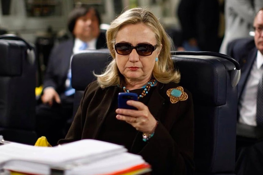 Hillary Clinton texting. When asked if she would run again in 2020, Clinton gave an ambiguous answer