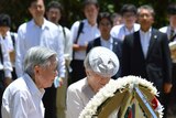 Japan's Emperor Akihito and Empress Michiko lay a wreath for US soldiers killed during WWII in Palau