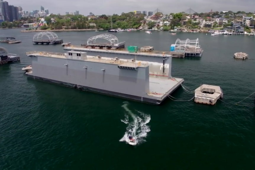 A dry dock sits in the harbour