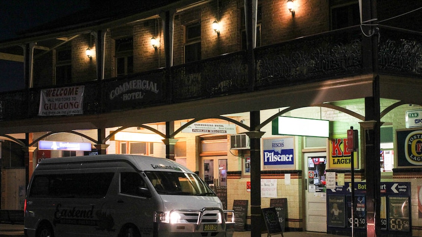 The Gulgong Nightrider Community Bus outside of the Commercial Hotel in Gulgong