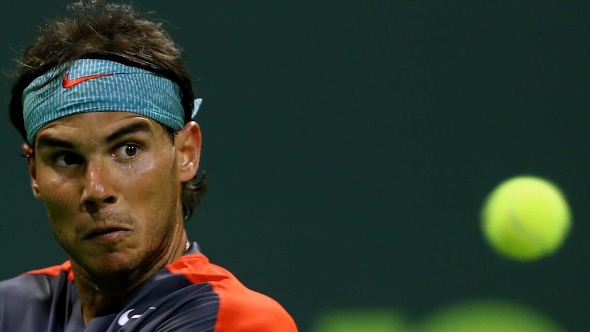 Spain's Rafael Nadal prepares to hit a return against Germany's Peter Gojowczyk at the Qatar Open.