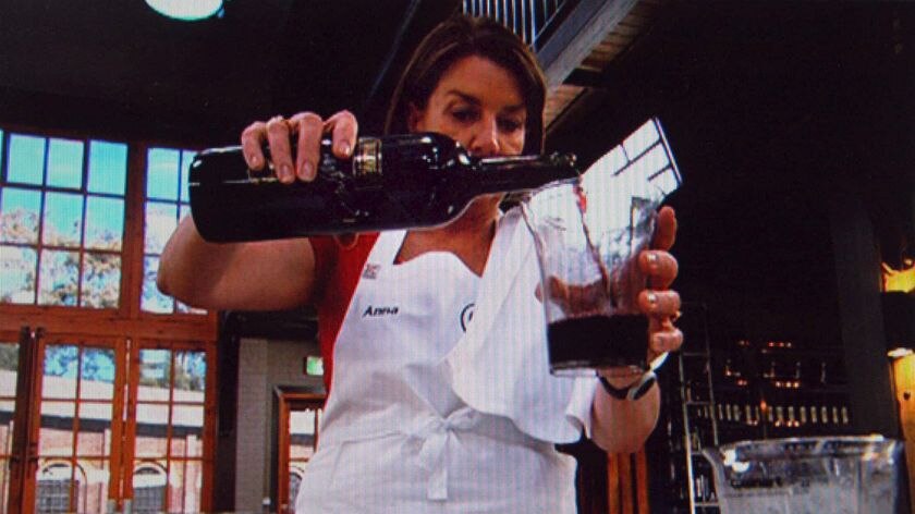 Queensland Premier Anna Bligh prepares a dish on Channel 10's Celebrity Masterchef