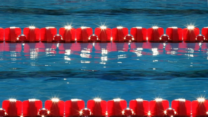 Lane ropes in an Olympic-sized swimming pool.