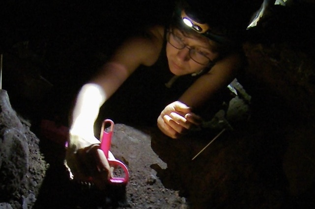 Elen Fuerriegel excavating in cave