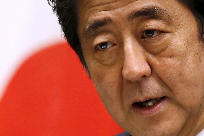 Japan's prime minister Shinzo Abe delivers a statement marking the 70th anniversary of the end of World War II