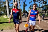 Melbourne Demons captain Max Gawn and Western Bulldogs captain Marcus Bontempelli in Kings Park with the AFL premiership cup.