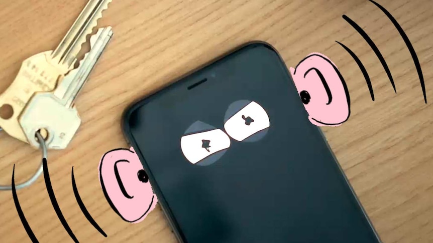 A phone with cartoon eyes and ears looking suspicious.