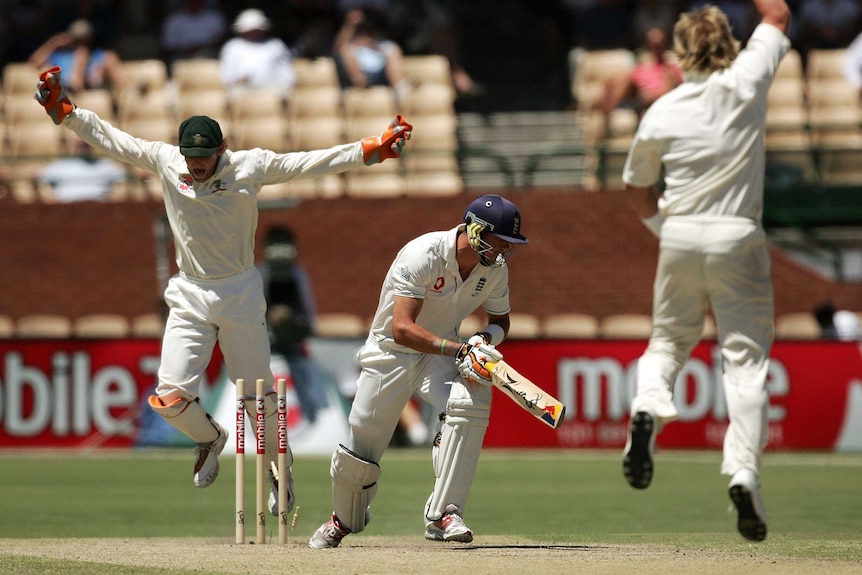 Adam Gilchrist and Shane Warne celebrate the wicket of Kevin Pietersen at Adelaide Oval in 2006
