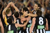 Collingwood celebrates one-point win over Richmond