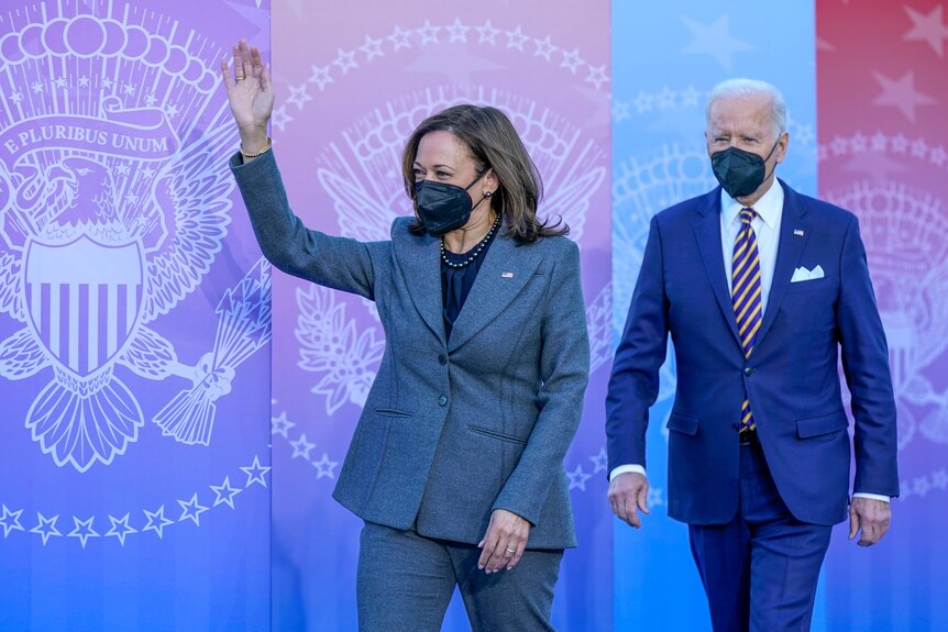 Kamala Harris and Joe Biden wave as they arrive to make an address at Atlanta University. 