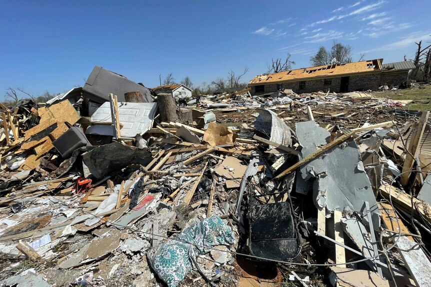 Debris from destroyed covers the ground in Silver City, Mississippi following a tornado
