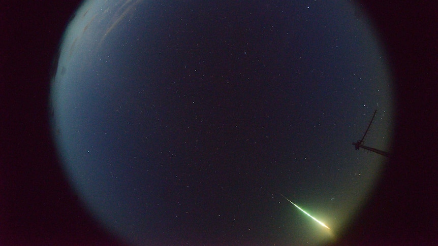 A fireball captured by a remote camera streaking across the night sky