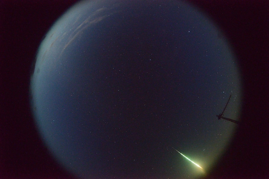 A fireball captured by a remote camera streaking across the night sky