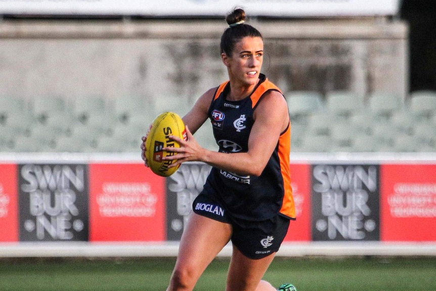 Australian Rules player Joanne Doonan on the field for Carlton