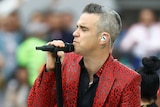 Robbie Williams performs at the World Cup opening ceremony