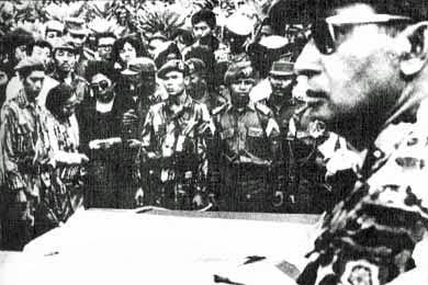 Suharto attending the funeral of five assassinated generals