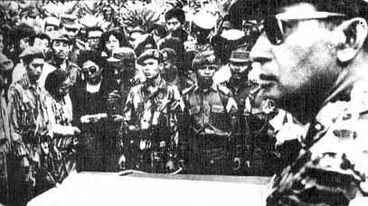 Suharto attending the funeral of five assassinated generals