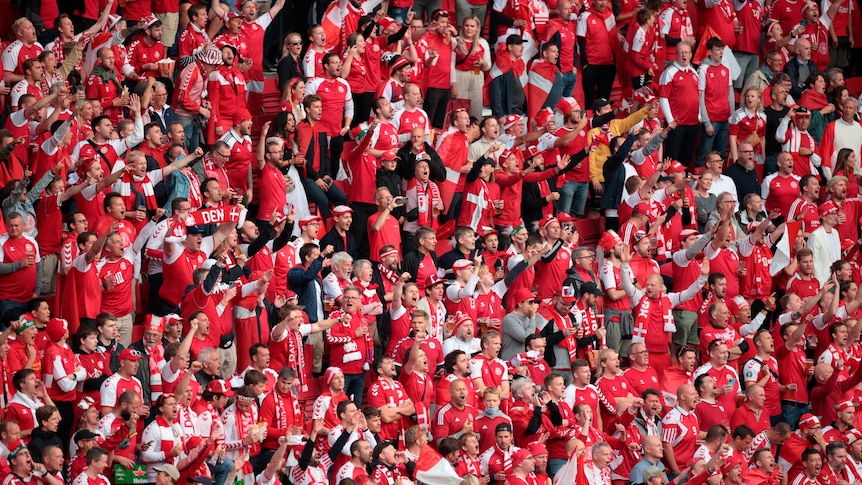 Rows and rows of Danish fans wait for the start of their Euro 2020 match against Russia.